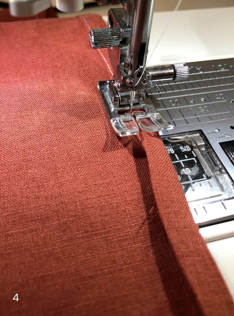 hemming a seam on a sewing machine